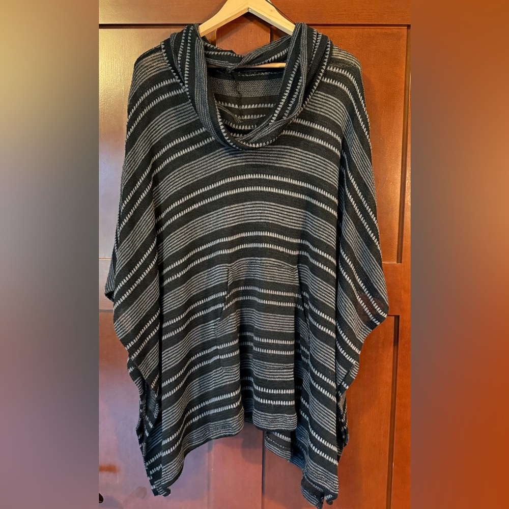Striped Black and Gray Open Weave Poncho With Pocket
Size Large